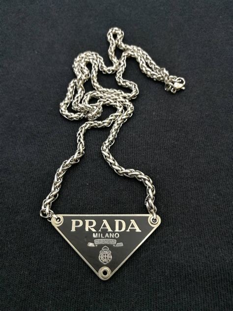 prada silver chain jewels.